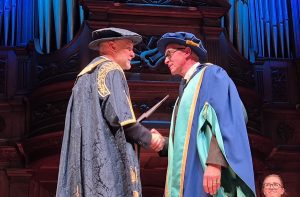 Nick Searl receives honorary doctorate from the University of the Built Environment